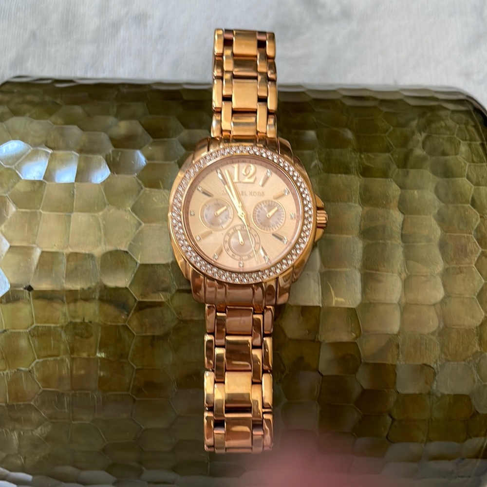 Michael Kors ladies watch and rose gold, ceramic case with rhinestone face